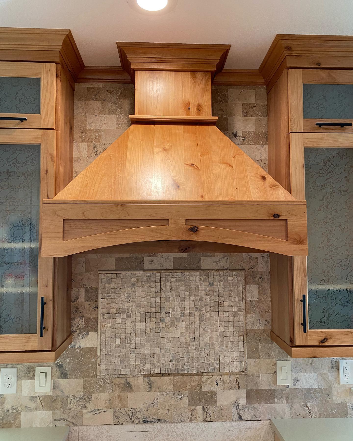 Custom knotty alder kitchen detail